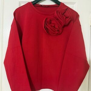Red blouse with floral accents oversized M